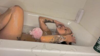 Soaked in the bath tub with bubbles