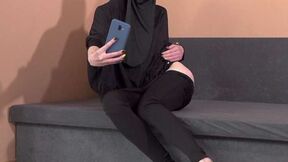 Female in niqab makes hot photos