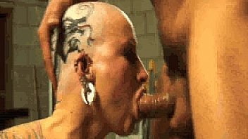 Tattooed MILF BlackWidowXXX and Lacy Love's kinky tattoo session turns into a wild fuckfest