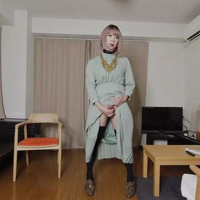 Japanese crossdresser cumshots when excited by genitals touched by long dress.