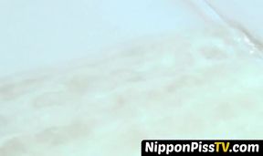 Beautiful Japanese babes peeing and having fun in public