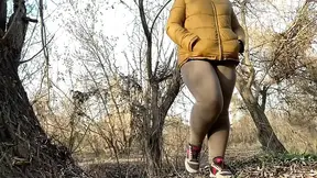 Wet pussy of a mature milf squatting and peeing