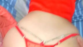 Teen Latina in red bikini bottoms