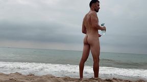 naked swimming on public beach in barcelona