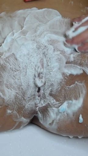 Spectacular moment from &quot;Intimate haircut take -off strip! Shaving hairy pussy with a trimmer and a razor! Close-up!&quot;