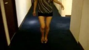 Skanky girlfriend flashing her flat tits on the cam in the hotel hallway