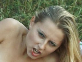 Blonde teen fingering and rubbing her pussy outdoors