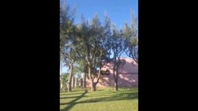 Stepmother in a Bikini in the Garden of the House Makes a Video for Her Stepson, to Show off Her New Clothes.