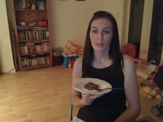 Amateur webcam brunette from Britain eats chocolate cake with cum