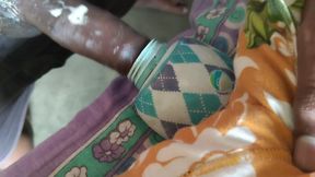 My husband is putting a cock in a bottle and punching his fist