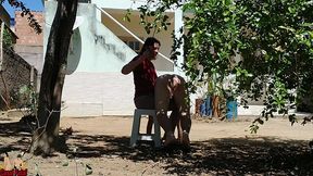 my wife discipline me in front yard. she is clothed, i m naked.