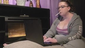 Sitting in front of the fireplace smoking a VS menthol 100 and working on my laptop