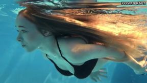 Golden goddess teen strips down for sultry solo swim sesh