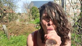 Outdoor dildo blowjob training