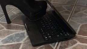 Metal tip heels destroy laptop