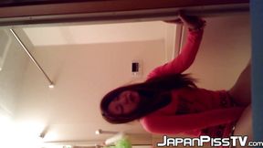 Sassy Japanese girl urinates on floors several times
