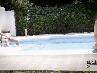 Having enjoyment in a pool of a swinger club!!