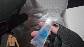 Playing with the pussy of a sex toy!