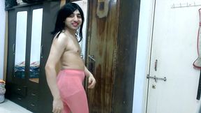 Cute and sweet sissy crossdresser femboy Sweet Lollipop tying out a pink pantyhose and pantie.