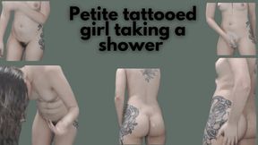 Petite tattooed girl taking a shower