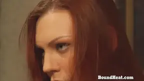 Lesbian slave gagged and bent over as her mistress fingers her juicy cunt