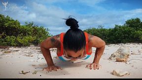 Push ups and chest flex on the beach
