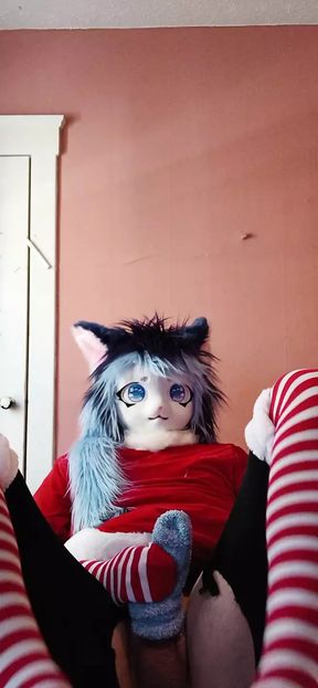 Masturbating and moaning on the bed in a christmas outfit
