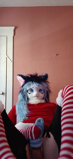 Masturbating and moaning on the bed in a christmas outfit