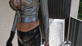 Latex Pierced Girl in black Mask and silver blouse in the balcony fucking huge rubber dildo and piercings Out in Public PART 2