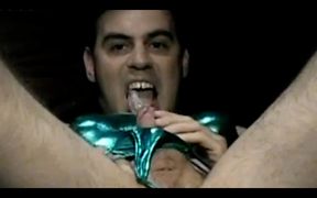 Stroking cock gets huge load in shemale's mouth.