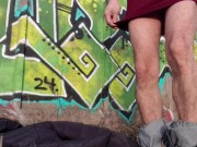 Femboy, exhibitionist undresses in public place