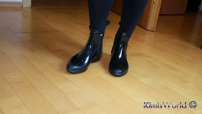 Rubber ankle boots and tan pantyhose