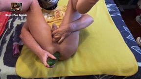boy fucks his ass with a toy cucumber.