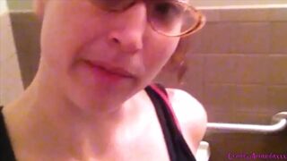 Cutie Amanda Pissing into the Restroom Wearing Glasses