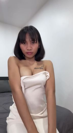 Asian woman in strapless dress