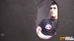 Young dude masturbates and cums in a guy's mouth through glory hole