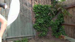 Nickey Huntsman poses for a nude backyard photo-shoot