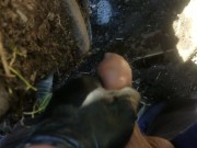 Pov lad unzips and flops it out to take a yellow piss next to muddy tire