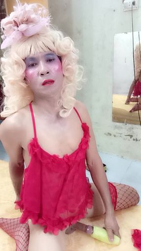 Oanh Le Transgender Wearing Suggestive Clothes to Play with Cans Pretending to Be Too Happy