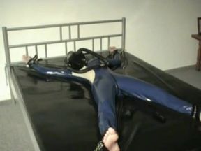 Latex Girl Sub Bondage In The Rubber Bed With Heavy Latex Gas Mask