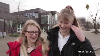 German girls enjoy themselves in a library in Berlin