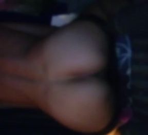 Shocked young man, half-naked, in bed looking down at his underwear