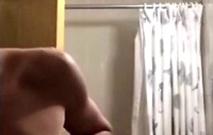 Girl shows her body in the shower