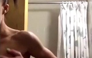 Girl shows her body in the shower