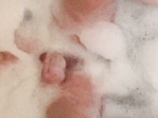 Tgirl masturbating in the bathtub