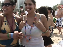 Hot chicks chasing beads by showing their tits at Mardi Gras