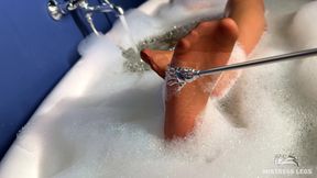 Scratching Mistress's Nylon Feet with a Scratcher in a Foam Bath