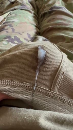 Horny soldier shoots creamy load through his military briefs and on his unit patch   Clip 1
