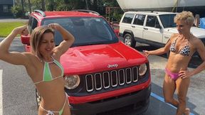 Lora and Lexi Flex and Strain as they try to lift a car