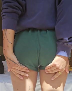 Curvy girl shows off her big booty in a goofy pose